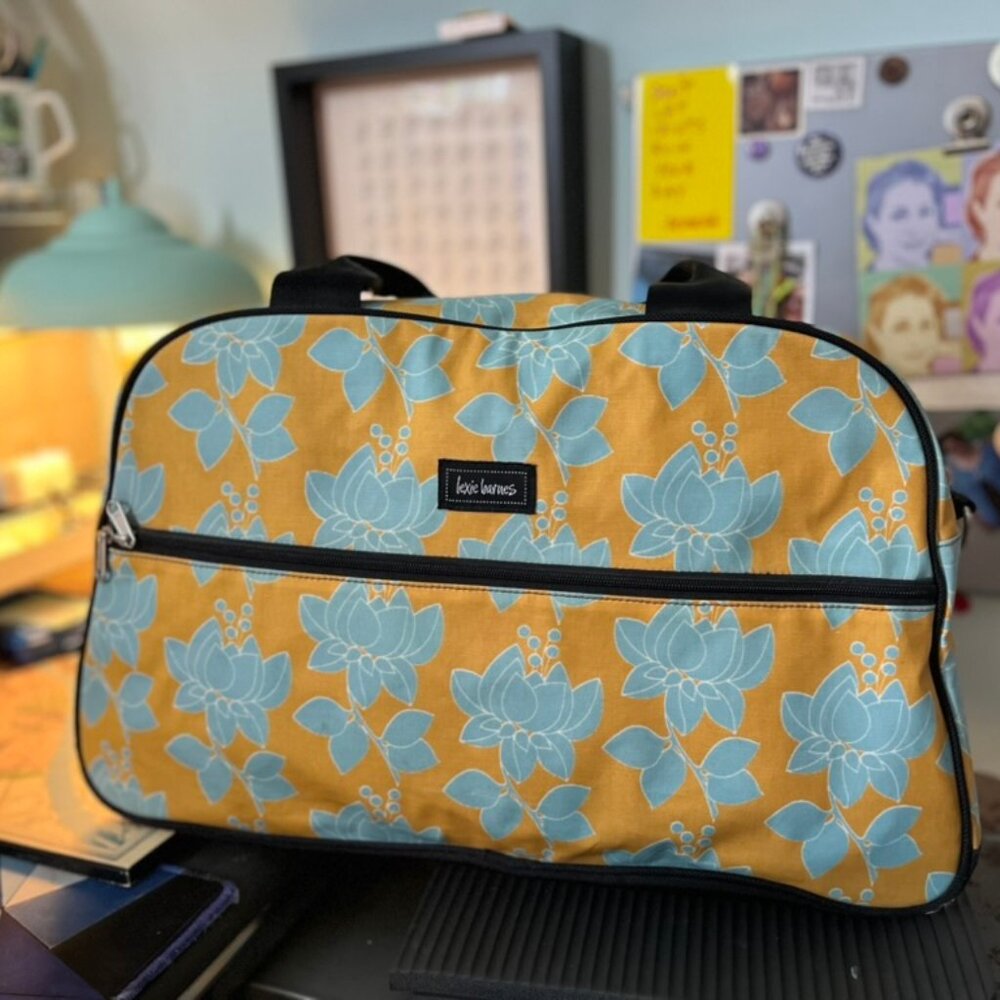 One of a kind Lexie Barnes laminated weekender bag
